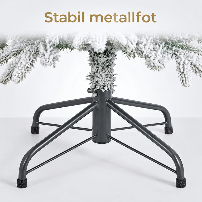 Snöpudrad konstgjord julgran med metallfot